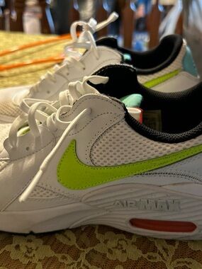 Nike’s White Sneakers with Neon Green Swoosh